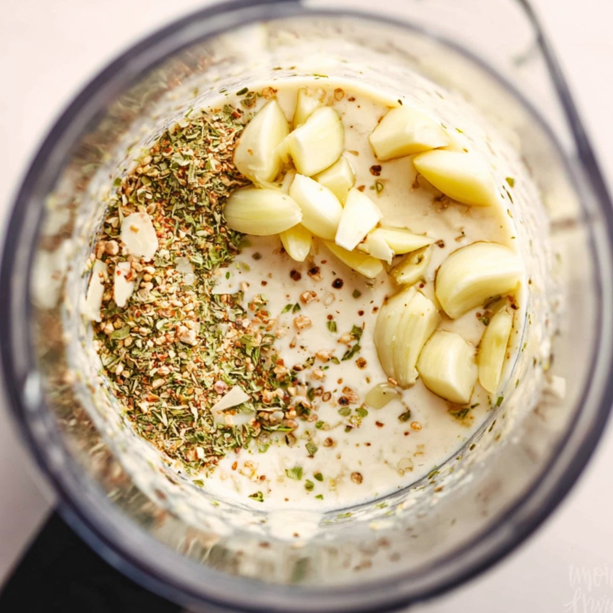 Easy Vegetable Casserole Recipe 11 Garlic and herbs in blender for sauce.