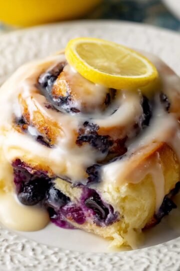 Easy Blueberry Lemon Sweet Rolls 1 Blueberry Lemon Sweet Rolls with glaze and lemon slice