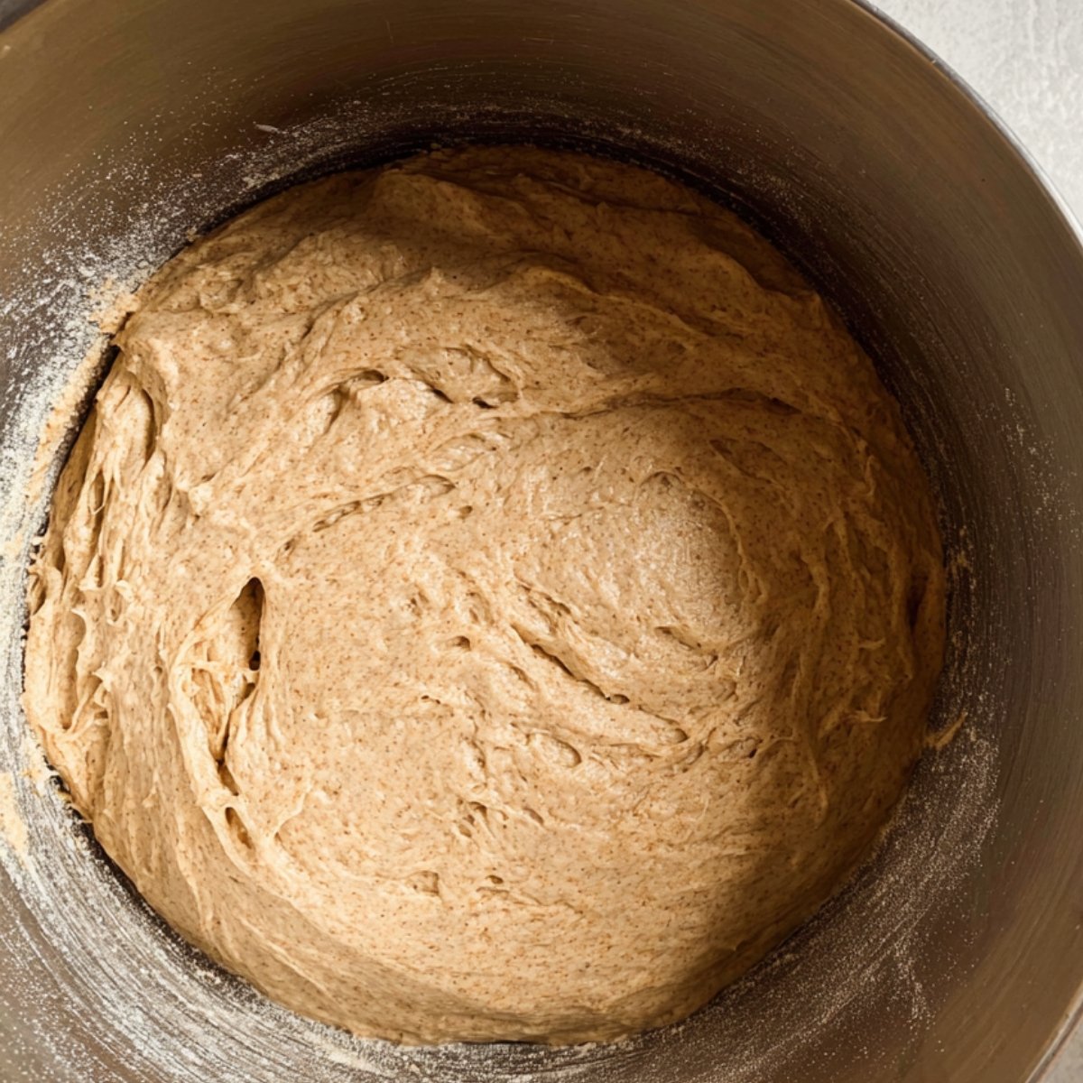 Easy Cinnamon Donut Bread 10 Smooth dough ready for rising in a bowl.