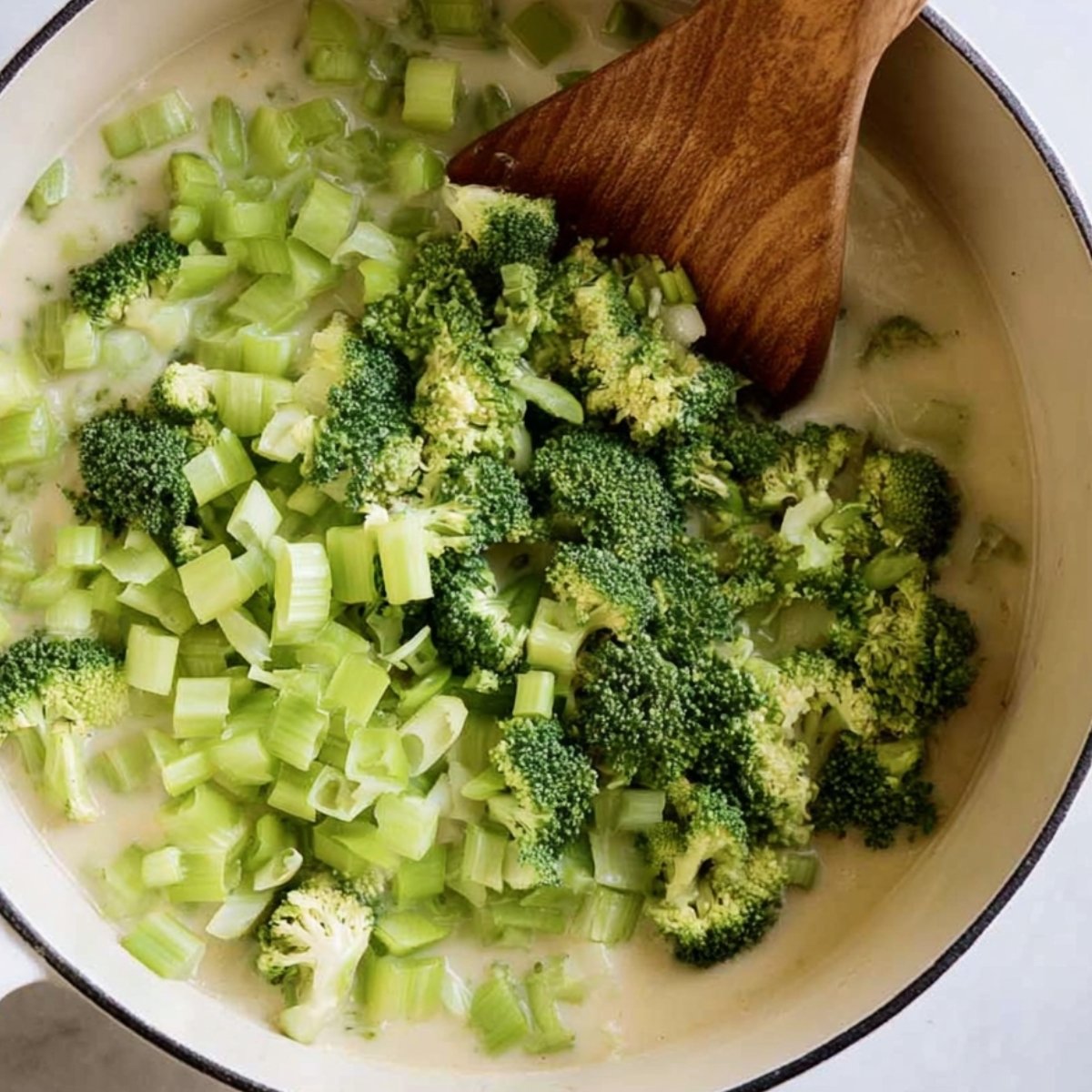 Easy Broccoli Cheddar Soup Recipe 11 Broccoli and celery cooking in creamy soup base.