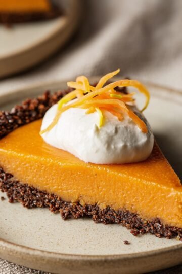 Easy Honey Carrot Pie Recipe 1 Slice of honey carrot pie with whipped cream.
